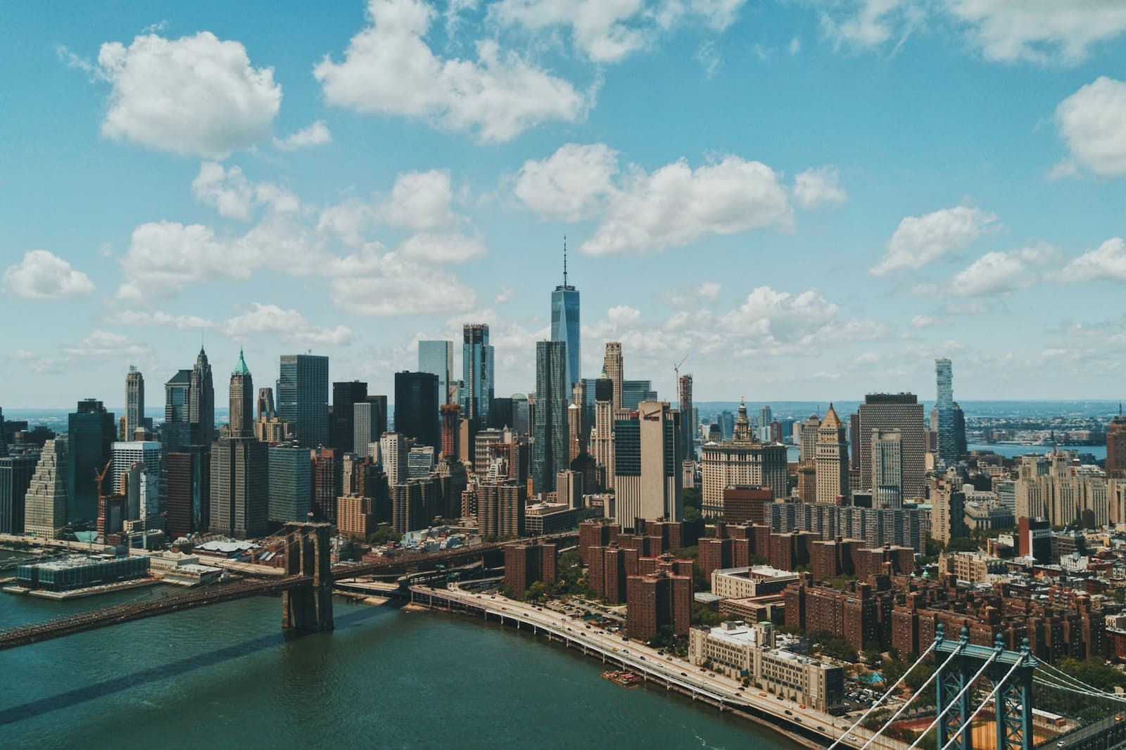 Manhattan skyline and Brooklyn Bridge over the East River, New York