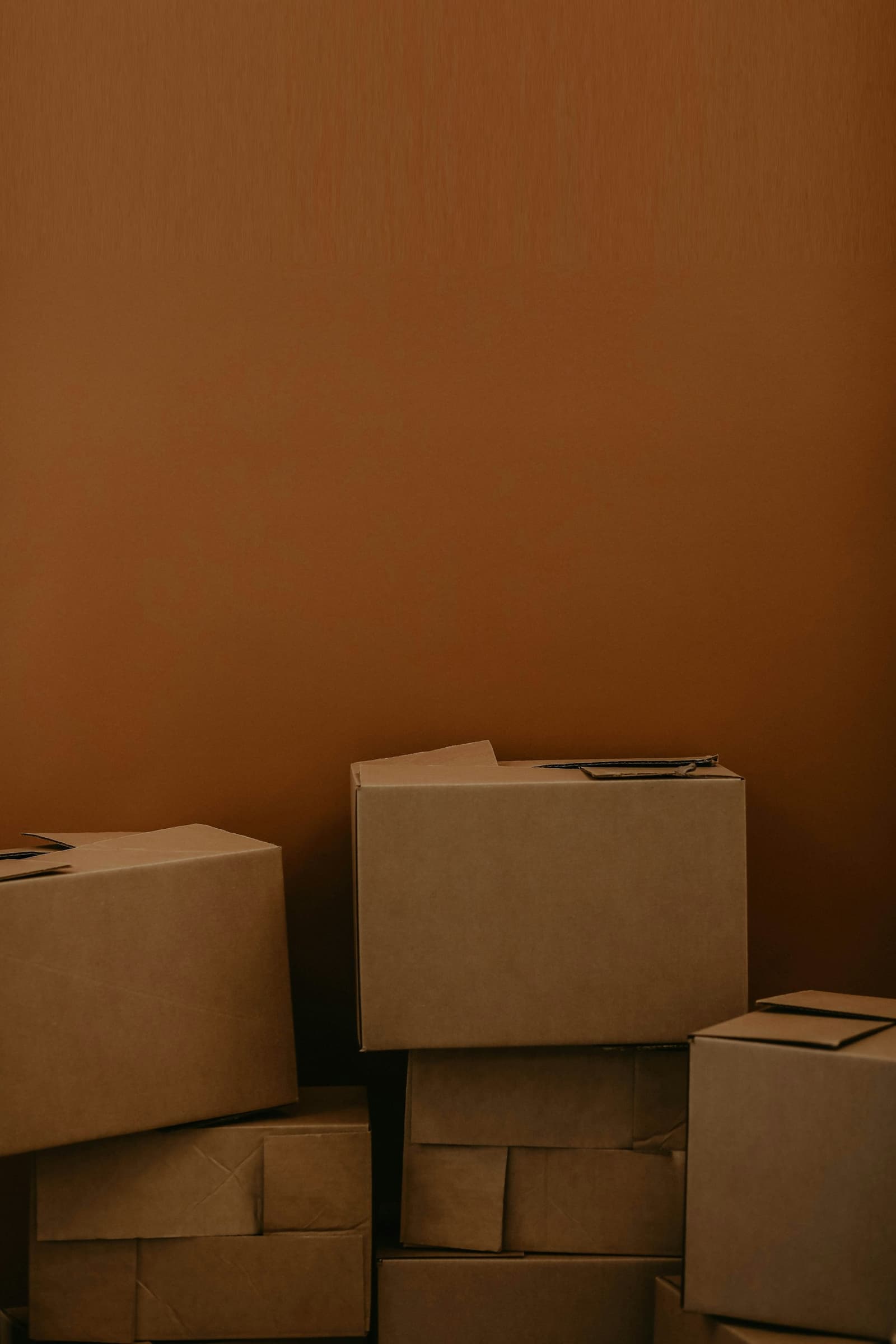 Stack of brown cardboard shipping boxes